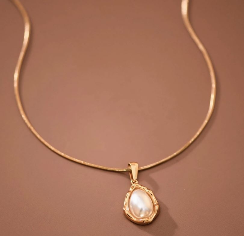 The Golden Pearl Necklace